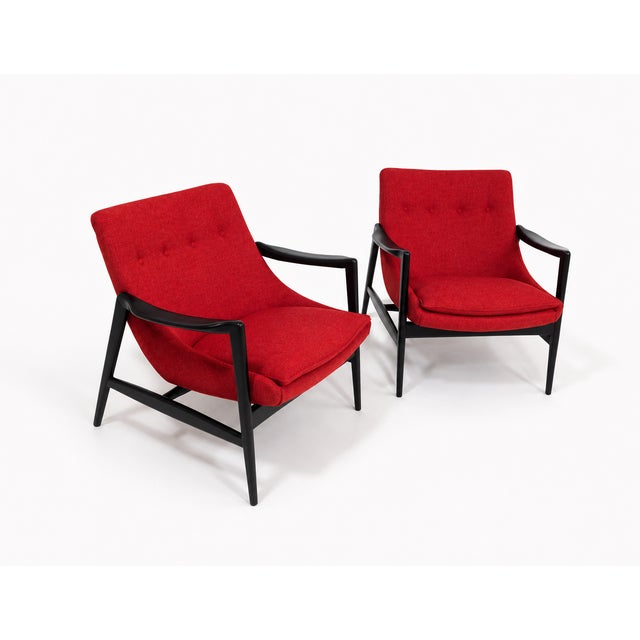 Mid-Century Modern lounge chairs in the style of Ib Kofod-Larsen. Stunning lounge chairs, mid-century style at its finest!...