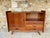 Mid-century, vintage oak buffet/storage unit, circa 1950's. the piece is made of oak, with a golden-oak colored veneered...
