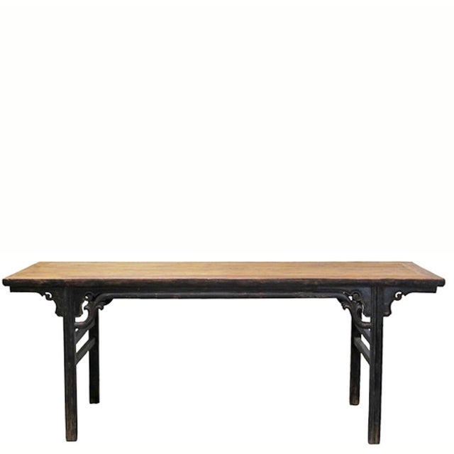 Constructed with traditional mortise and tenon joinery, this early-18th century painting table features a wide, flush-...