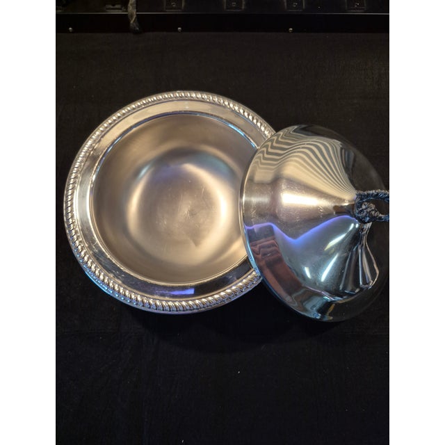 This is a vintage F.B. Rogers Silver Company round, footed covered casserole or buffet serving dish #1158. Physical...