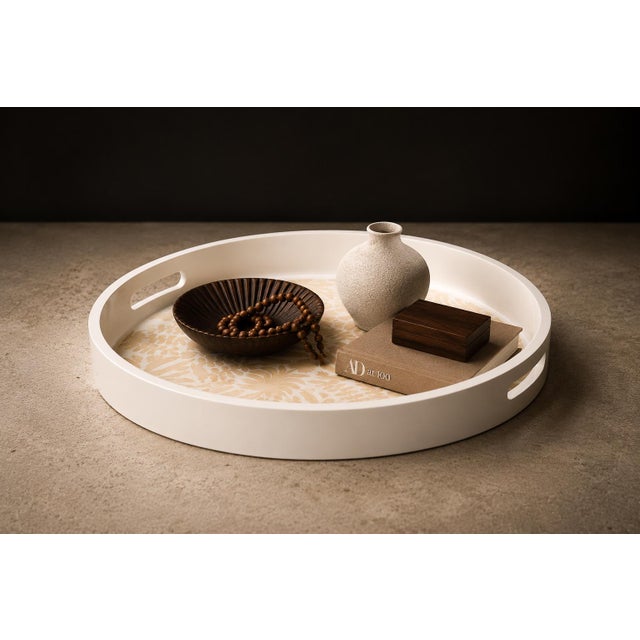 Executed in the historic maque lacquer tradition of Olinalá, Guerrero, this circular tray reflects a lineage of Mexican...