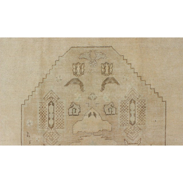 Faded Turkish Oushak Rug With Cream and Brown Central Medallion For Sale - Image 9 of 10