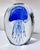 Hand blown cobalt blue glass jellyfish paperweight. Crafted from lead free glass featuring internal bubbles to create a...