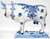 A finely painted large ceramic faience cow, decorated with underglaze blue floral motifs. Circa 1874 -1900, bearing the...