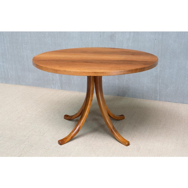 This very rare dining table was designed by Osvaldo Borsani in 1945 and produced by his company Arredamenti Borsani in...