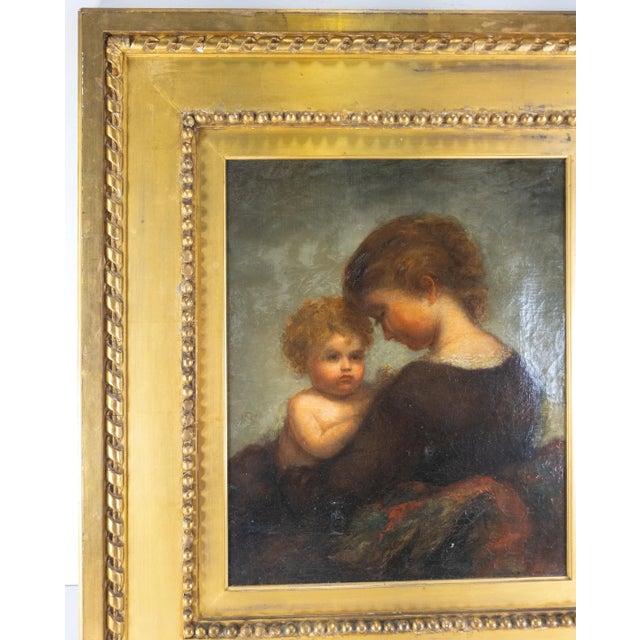 We are selling this very fine oil painting on canvas of a mother and child. The painting is very well executed and appears...