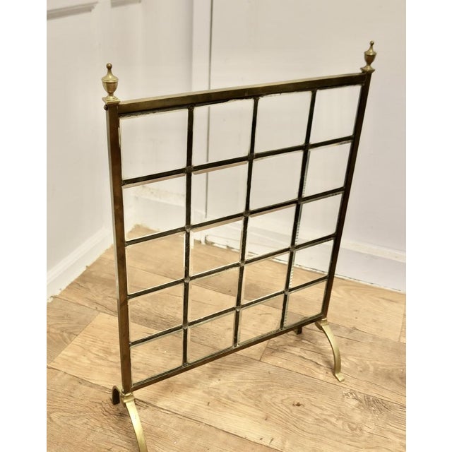 A Victorian Brass and Glass Art Nouveau Fire Screen This is a most charming Fire Screen in the art nouveau style, it has...