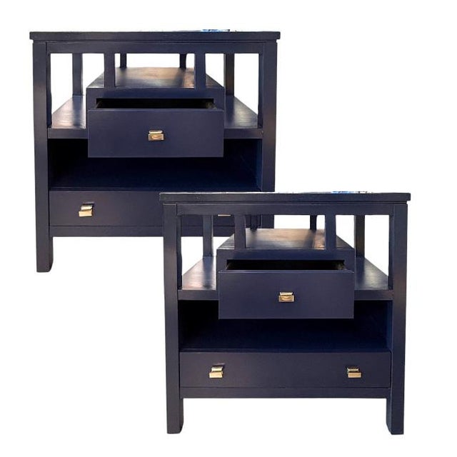 A pair of Stanley Furniture two-drawer nightstands, professionally refinished in a striking Benjamin Moore Old Navy...