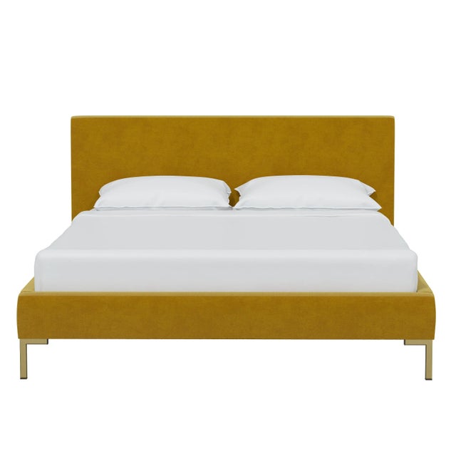 Featured in luxurious fabrics and supported by gorgeous brass Y legs, this platform bed is a force to be reckoned with....