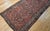 "A beautiful and rare 19th century Persian Farahan wide runner featuring the classic Herati pattern on a rich rust-red...