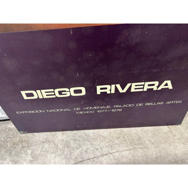 Vintage poster advertising a 1977-1978 exhibition of Diego Rivera's work at the Palacio de Bellas Artes in Mexico. The...