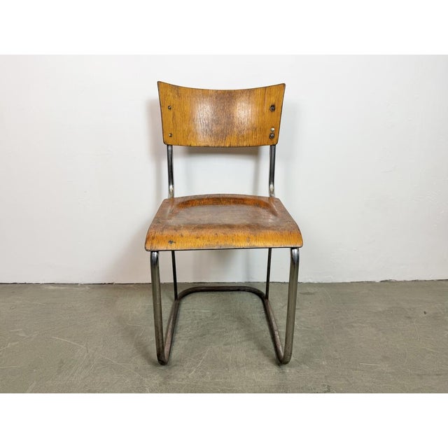 Vintage industrial chair made in former Czechoslovakia during the 1960s. The construction is made of chrome plated iron...
