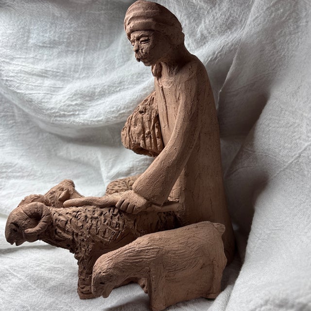 Vintage signed? On back. Redware / terra -cotta figurine of a shepherd and 4 sheep. Nicely detailed example. Vintage...