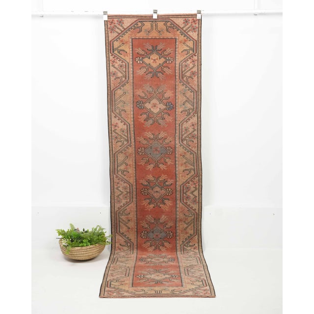 Vintage Turkish Hand-Knotted Runner rug is a semi-antique vintage runner rug. The '70s Eastern region of Anatolian's...
