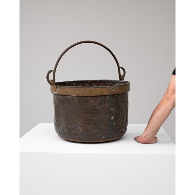 Step back in time with this authentic Early 19th Century Copper Bucket, a testament to enduring craftsmanship and vintage...