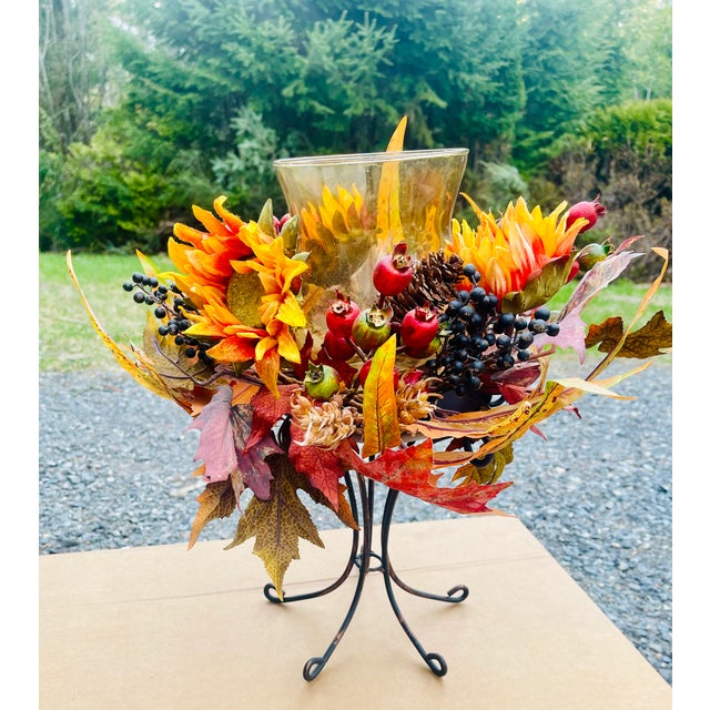 Warm your holiday heart with this stunning Sunflower Candelabrum. Stranding proudly at 16” tall, this candelabrum will...