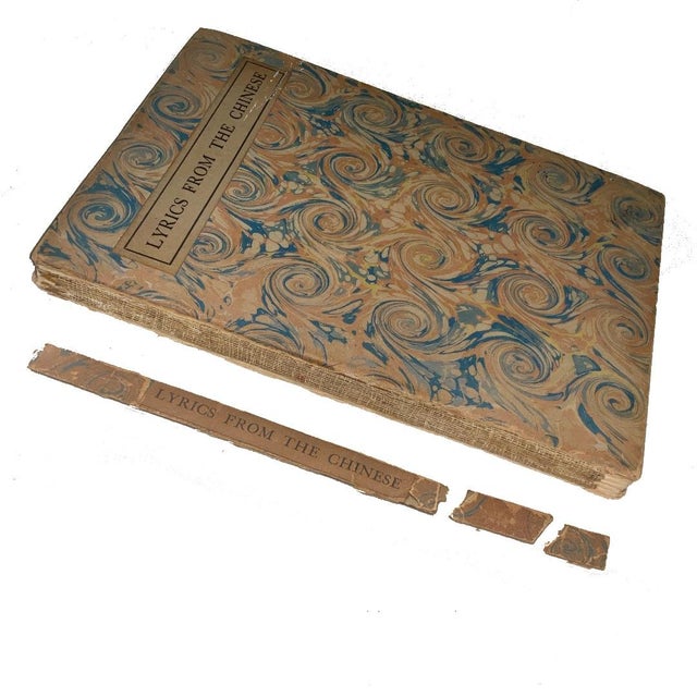Rare copy of Lyrics from the Chinese by Helen Waddell. A lovely book of poetry. The marbled paper binding is quite worn,...