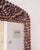 A wider format wall mirror with a dense pinecone frame, built from natural elements applied over a wood structure. The...