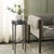 Introducing the Castiel hammered side table, a stunning addition to any living space. This piece features a unique grey...