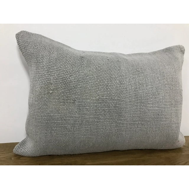 This is a vintage Turkish Anatolian kilim rug from the 1960s. The piece was hand-woven. Just cover no insert