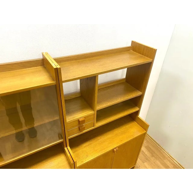 This modular chest of drawers with extension was produced by ÚLUV as part of the Krásná Jizba program in Czechoslovakia...