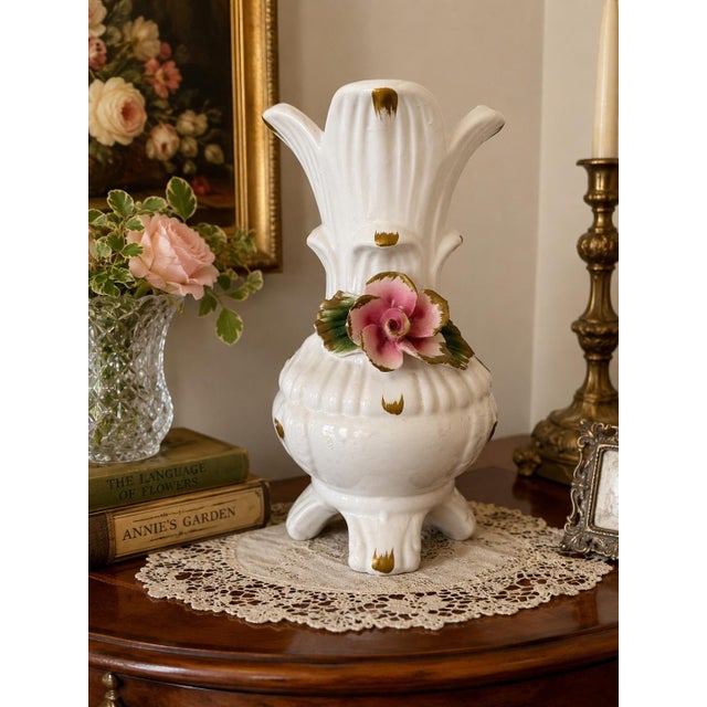 Elegant vintage Capodimonte porcelain trumpet vase featuring a distinctive flared silhouette, sculptural four-footed base,...