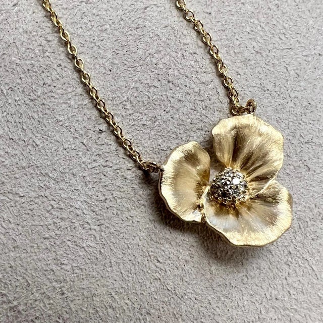 Created in 18 karat yellow gold Diamonds 0.15 carat approx. 18 inch chain with loops at 16 & 17th inch 18 kyg lobster lock...