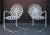 Set of four mid century French Art Deco cantilever garden chairs by Francois Carre. Wrought iron with rocking cantilevered...
