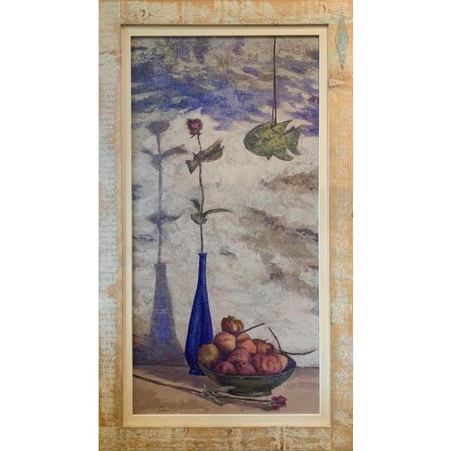 A cobalt blue vase rises from a worn tabletop, cradling two long-stemmed roses against a background that dissolves into...
