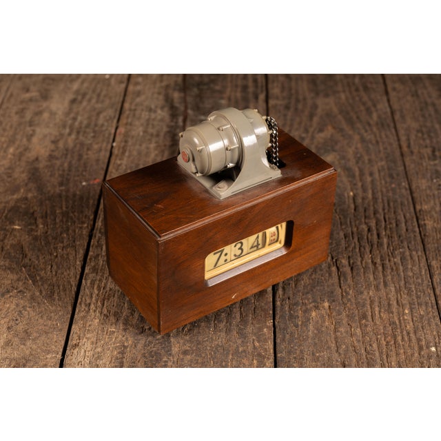 c. 1940s/1950s; United States Electrical Motors, Inc. - Los Angeles, CA Industrial electric cyclometer-style flip clock...