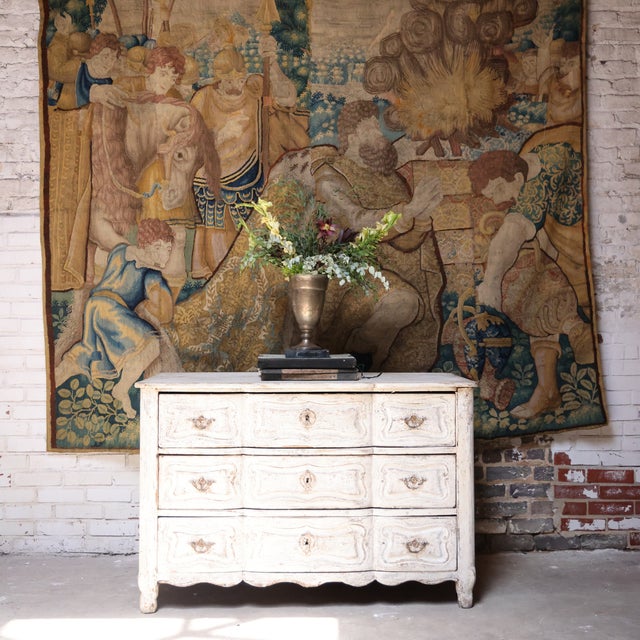 17th-century Flemish tapestry woven from wool, originating from Flanders, Belgium. Rich in detail and texture, this...