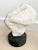 Marble sculpture carved by artist Eugene Gauss, signed and dated 1983. Displays two embracing abstract faces that becoming...