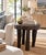 A remarkable antique hand-carved wood and iron side table dating to the early 20th century. Constructed from substantial...