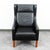 High quality black leather Danish modern wingback lounge chair. This piece was imported directly from Denmark in our...