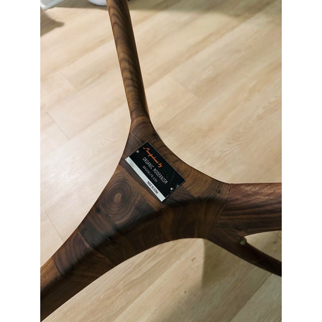 Oblong Beveled Clear Glass 62” Table With “Organic Modernism" Faux Wooden Metal Base For Sale - Image 9 of 10