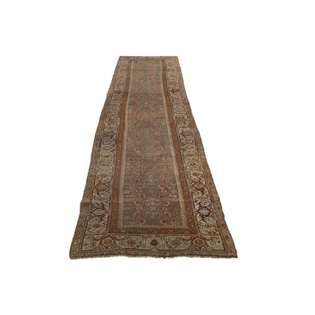 This Persian Bidjar wool rug possesses an antique allure, showcasing impeccable hand-knotted wool in a gray field. The...