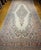 This vintage oversized Persian Qazvin rug is a stunning example of fine craftsmanship and timeless design, inspired by the...