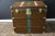 This beautiful and very rare Moynat trunk features a beautiful checkered canvas, honey-colored leather trim, large leather...