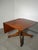 A beautifully crafted antique oak dining table featuring a striking parquet-style inlaid top and an elegant pedestal base....