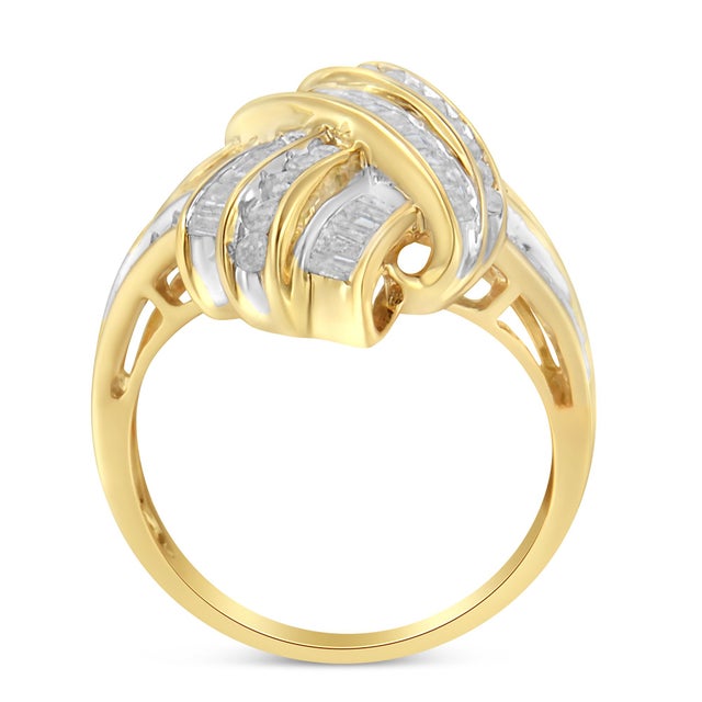 This gorgeous ribbon style knot statement ring is crafted in 10 karat yellow gold flashed 92.5% sterling silver. Natural,...