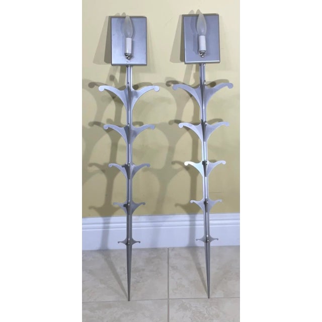 Elegant pair of wall sconces made of solid steel with one 60/watt light each, great clean look Vertically. UL approve up...