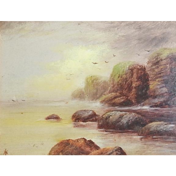 1911 oil on board painting of rocky sea coast. Initialed JH lower left corner, note on verso titled Morning at Lands End...
