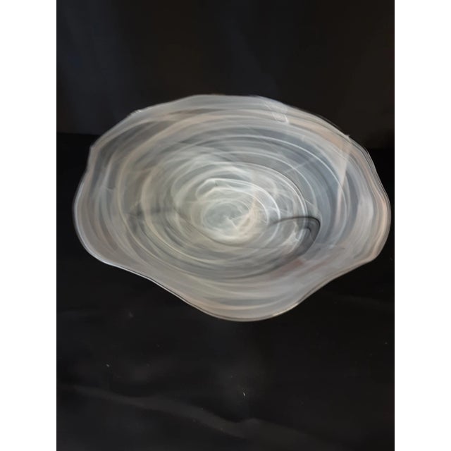 Beautiful large handblown glass bowl. Muted colors of white beige and black. Artist unknown.