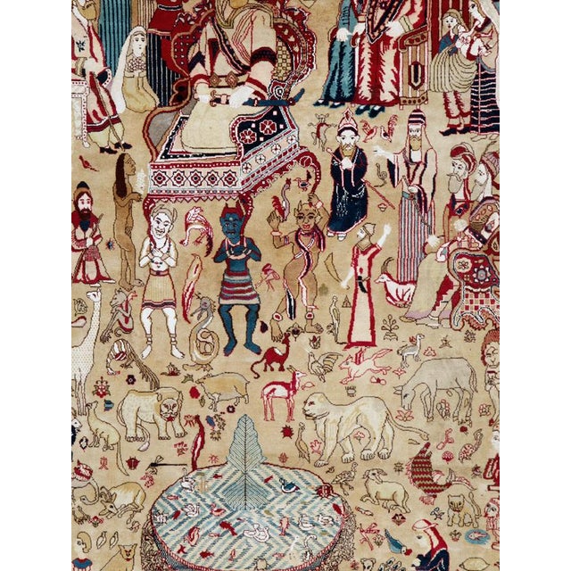 A vintage Indian Lahore Pictorial rug from the mid-20th century. Measures: 5' 0" x 8' 1"