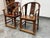 Design Plus Gallery presents a Pair of Antique Horseshoe Ming Arm Chairs. This pair of large antique Chinese horseshoe...