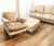 Luxurious Comfort: Sink into the supple, cream-colored leather of the Liz Claiborne sofa, offering both exceptional style...