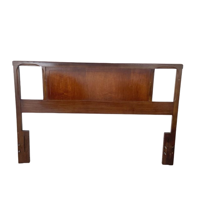 There’s a playful sculptural quality to this walnut headboard that sets it apart from more predictable mid-century...