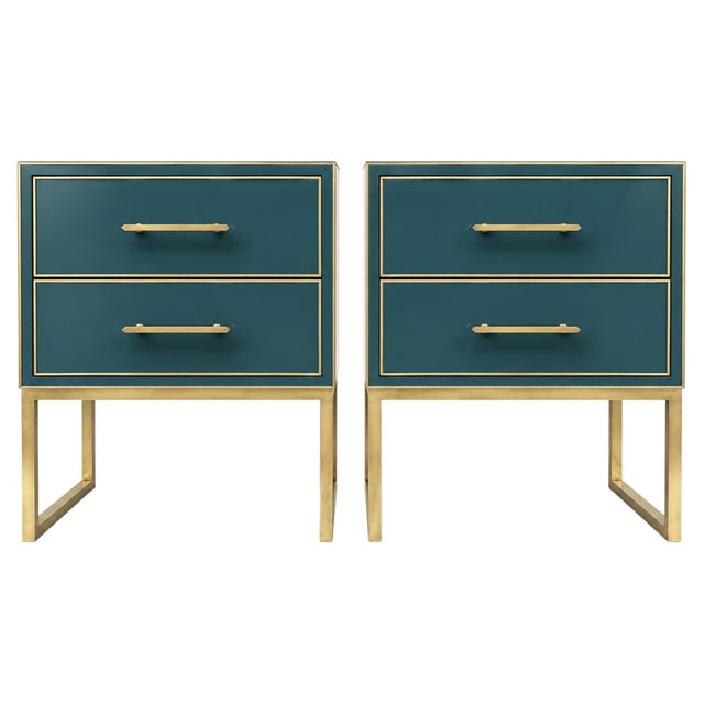 Deep petrol teal Murano glass lends a rich, architectural finish to this pair of Italian bedside tables by...