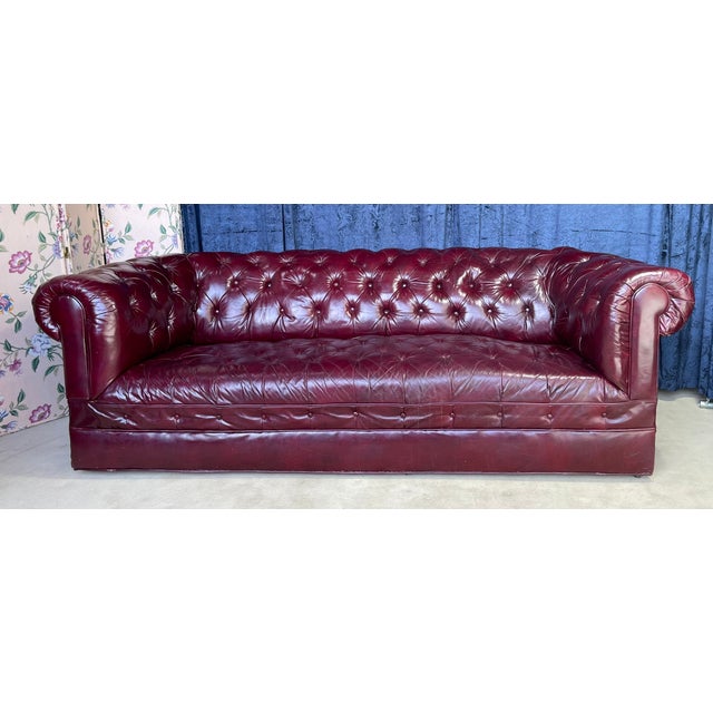Burgundy Tufted Leather Chesterfield Sofa – Classic Sophistication, Unmistakable Presence Command attention with this...