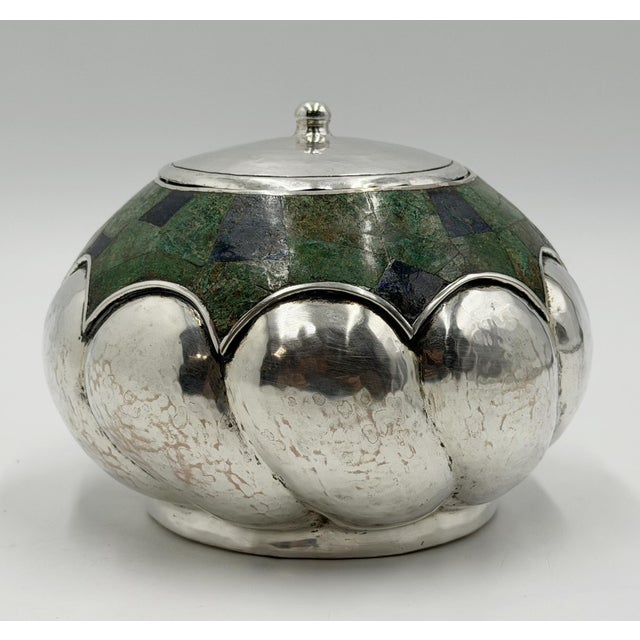 Exceptional 1960s Mexican Modernist lidded bowl by Los Castillo, handcrafted in Taxco, Mexico. This sculptural vessel...